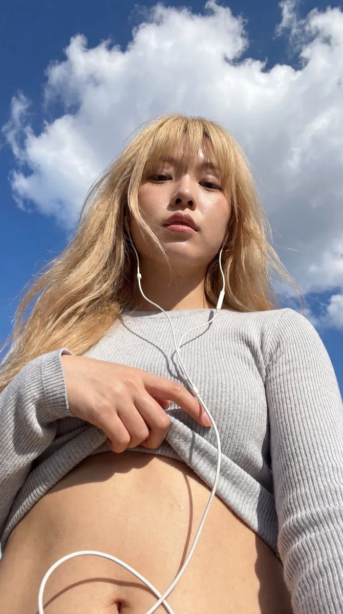 No. 13: Profile / Avatar - Realistic Outdoor Low Angle Sky Selfie — Nano Banana Pro image prompt example