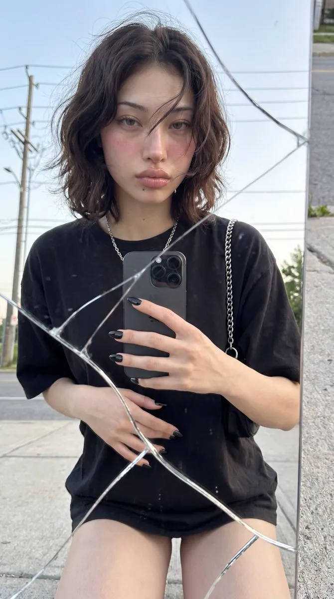 No. 20: Social Media Post - Photorealistic Cracked Mirror Selfie — Nano Banana Pro image prompt example