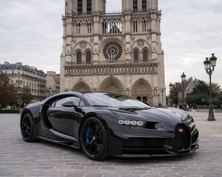 Photorealistic Automotive Shot of a Sleek, Glossy Black Bugatti — GPT Image 2 image prompt example