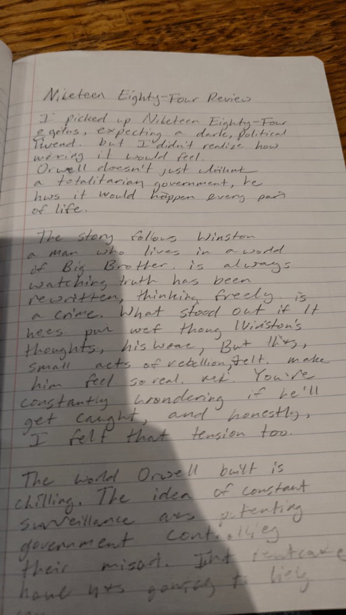 Hyper-realistic Phone-shot Image of a Notebook Page with Messy, Bad — GPT Image 2 image prompt example