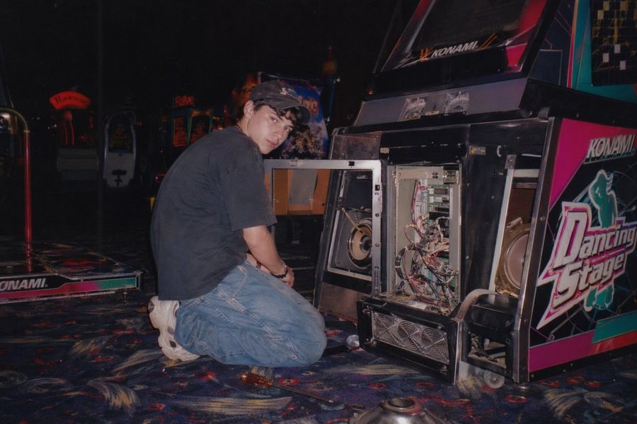 Vintage, Late 90S Amateur Flash Photograph of a Young Man Repairing — GPT Image 2 image prompt example