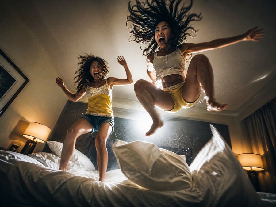 Cinematic Bed Jump Photo — GPT Image 2 image prompt example