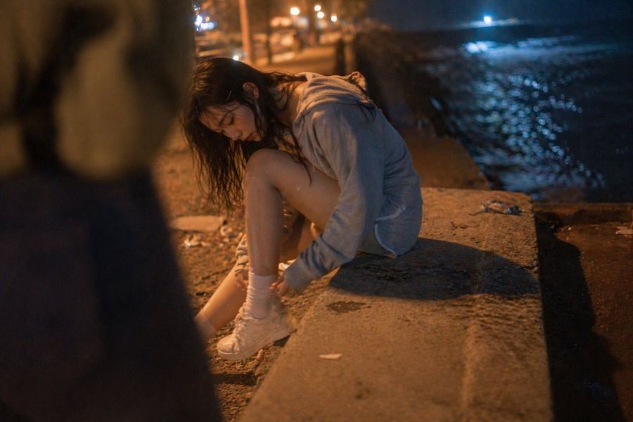 Cinematic Candid Night Seashore Portrait — GPT Image 2 image prompt example