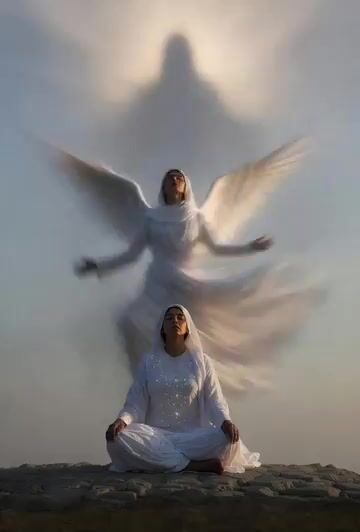 Female Indian Sufi Sitting in Meditation Dressed in White Made — Grok Imagine video prompt example