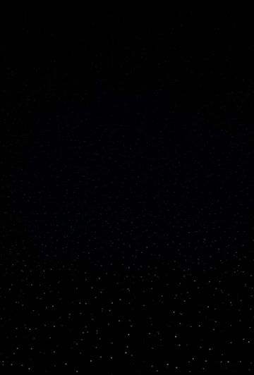 Points of Light of Varying Degrees of Brightness Mimicking Human — Grok Imagine video prompt example