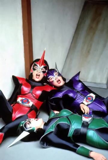Three Defeated Female Villains in Tokusatsu Style, Lying — Grok Imagine video prompt example