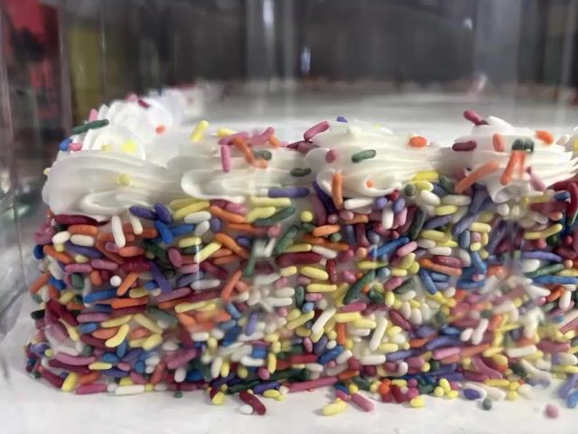Use the Design That Is in the Picture for the Cake and Enjoy Slice — Grok Imagine video prompt example