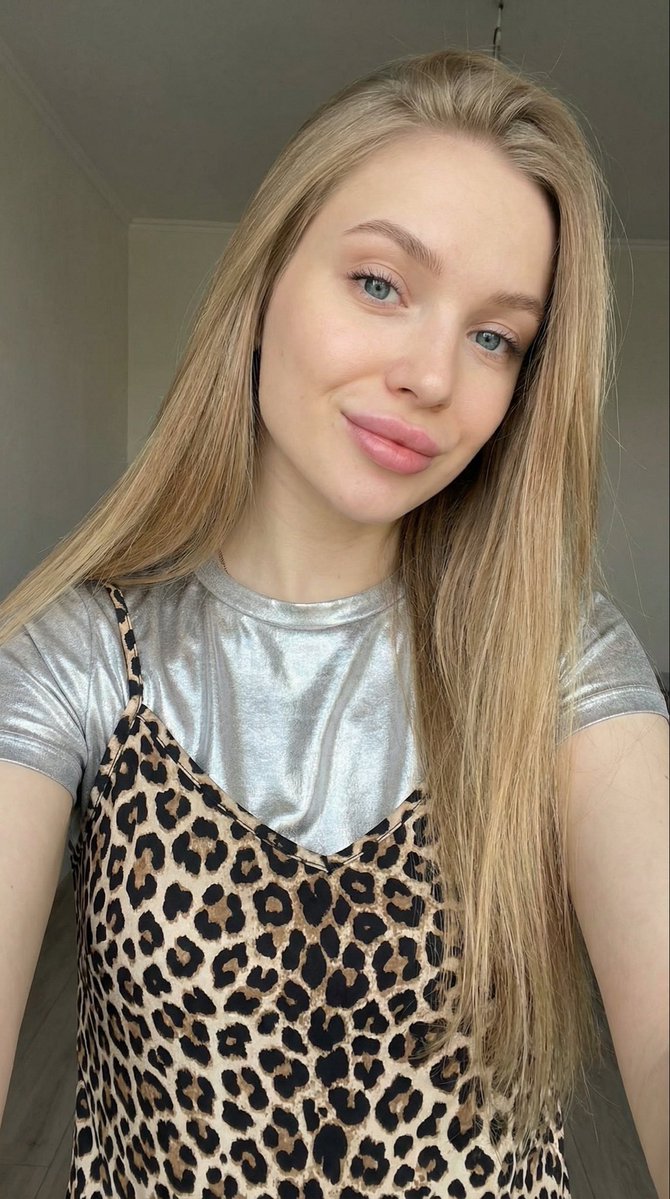 Close-up Selfie of a Young Beautiful Woman with Long Straight Light — Nano Banana Pro image prompt example