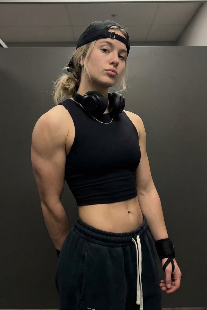 Young Adult Athletic Woman with Pronounced Muscular Arms and Defined — Nano Banana Pro image prompt example