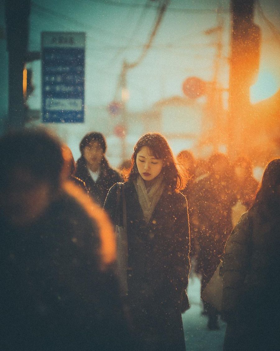 Young Asian Woman Walking Alone Through a Busy Crowd, Solitary — Nano Banana Pro image prompt example