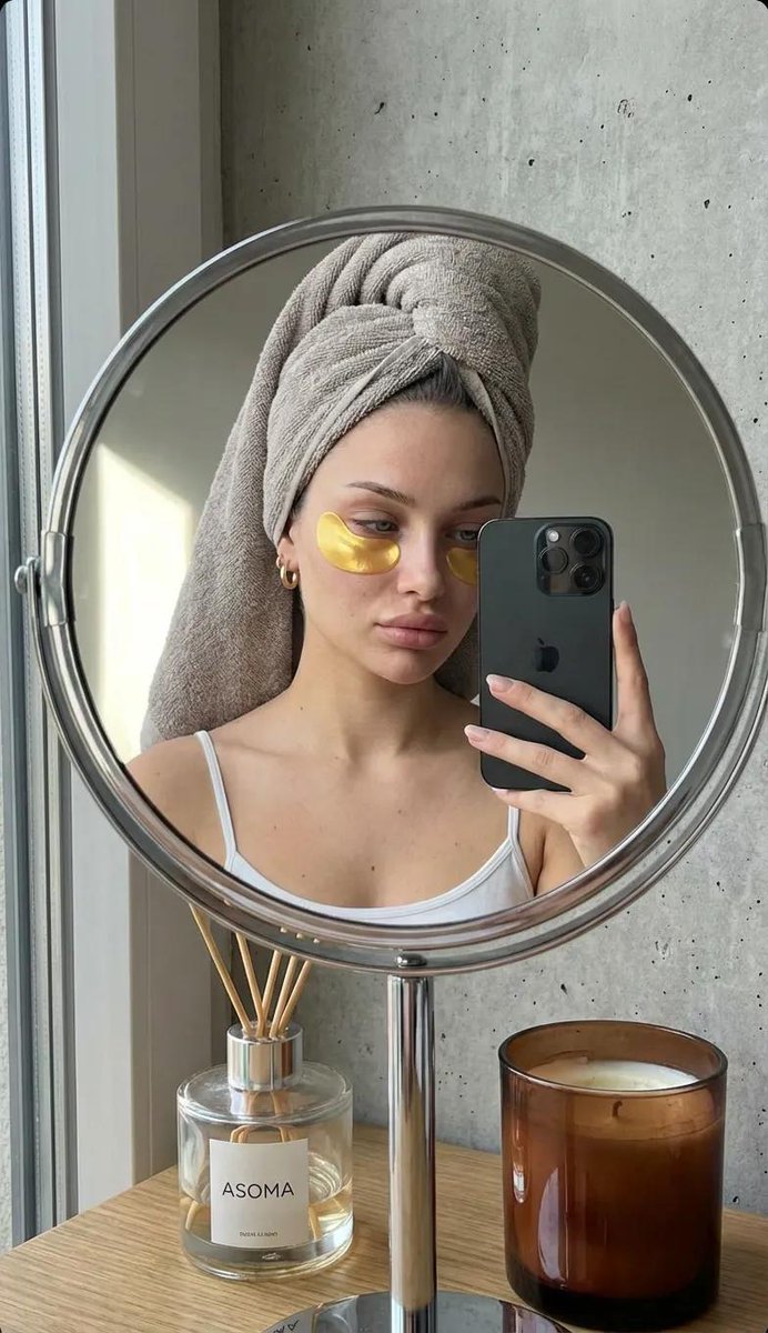 Highly Realistic Mirror Selfie of a Young Woman Taken Through — generated with Nano Banana Pro