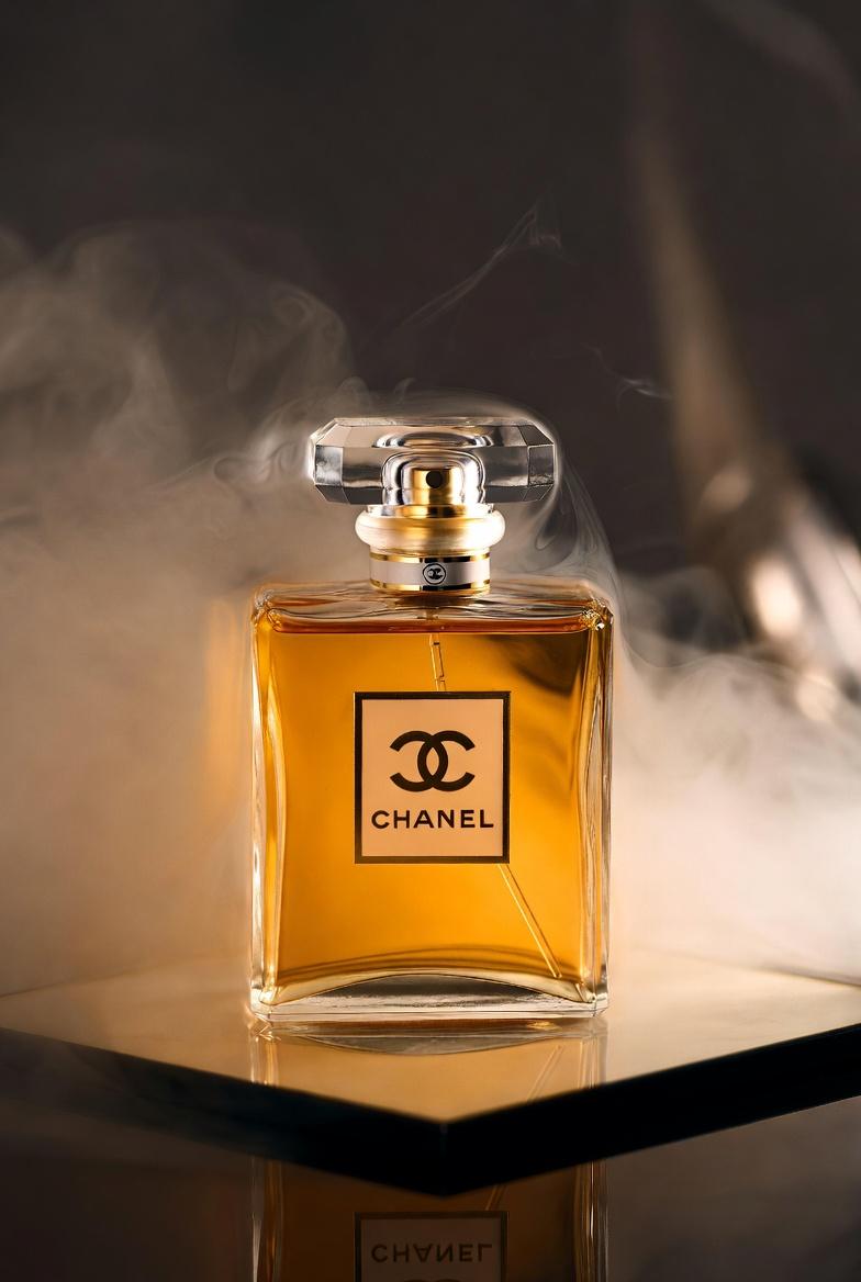 Hyper-realistic Studio Product Shot of a Chanel Perfume Bottle Placed — Nano Banana Pro image prompt example