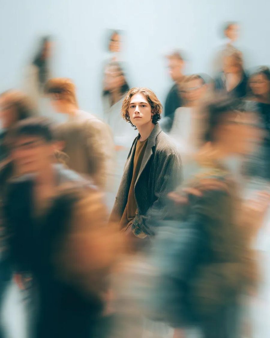 Cinematic Portrait of a Young Person Standing Still in the Middle — Nano Banana Pro image prompt example