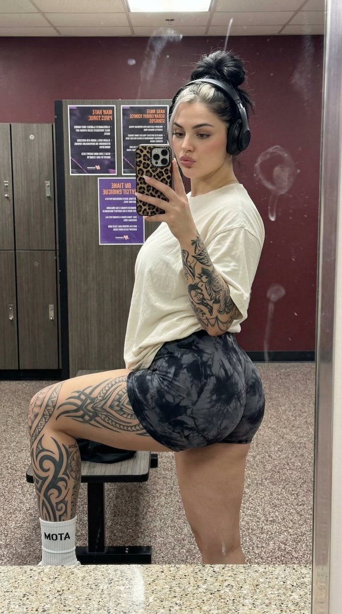 Athletic Woman Post Workout Mirror Selfie With Tattoos — Nano Banana Pro image prompt example