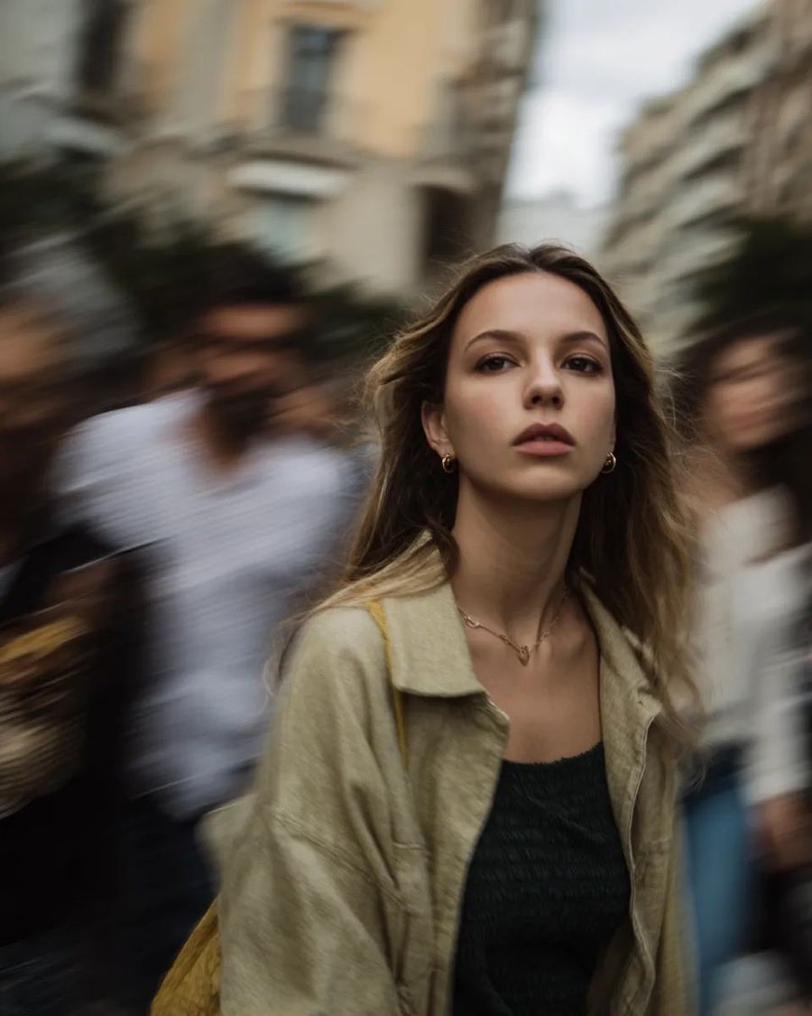 Cinematic Street Portrait With Motion Blur — Nano Banana Pro image prompt example