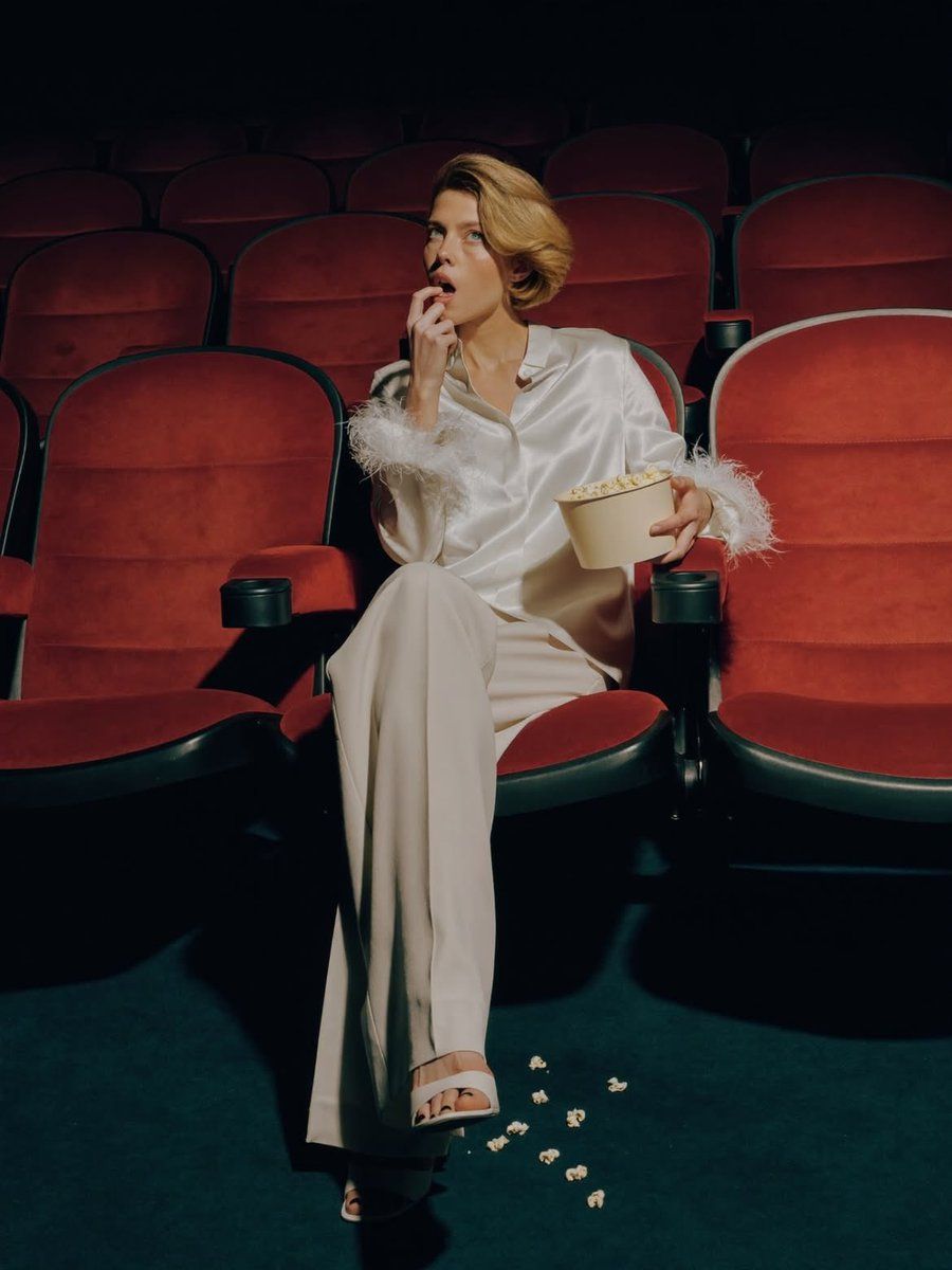 Elegant Fashion Editorial In A Dark Movie Theater — Nano Banana Pro image prompt example