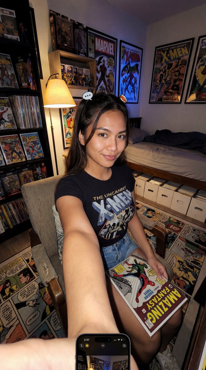 Filipina Comic Geek Selfie In Collectors Room — Nano Banana Pro image prompt example