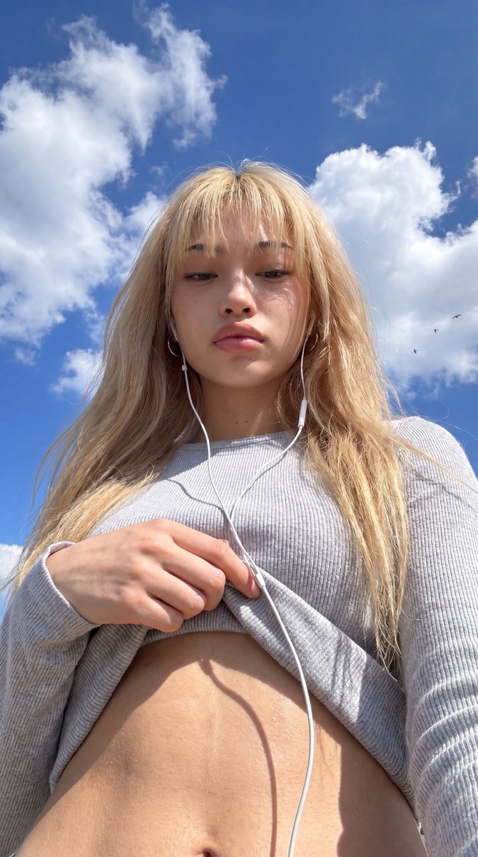 Low Angle Sky Smartphone Selfie — Nano Banana Pro image prompt example