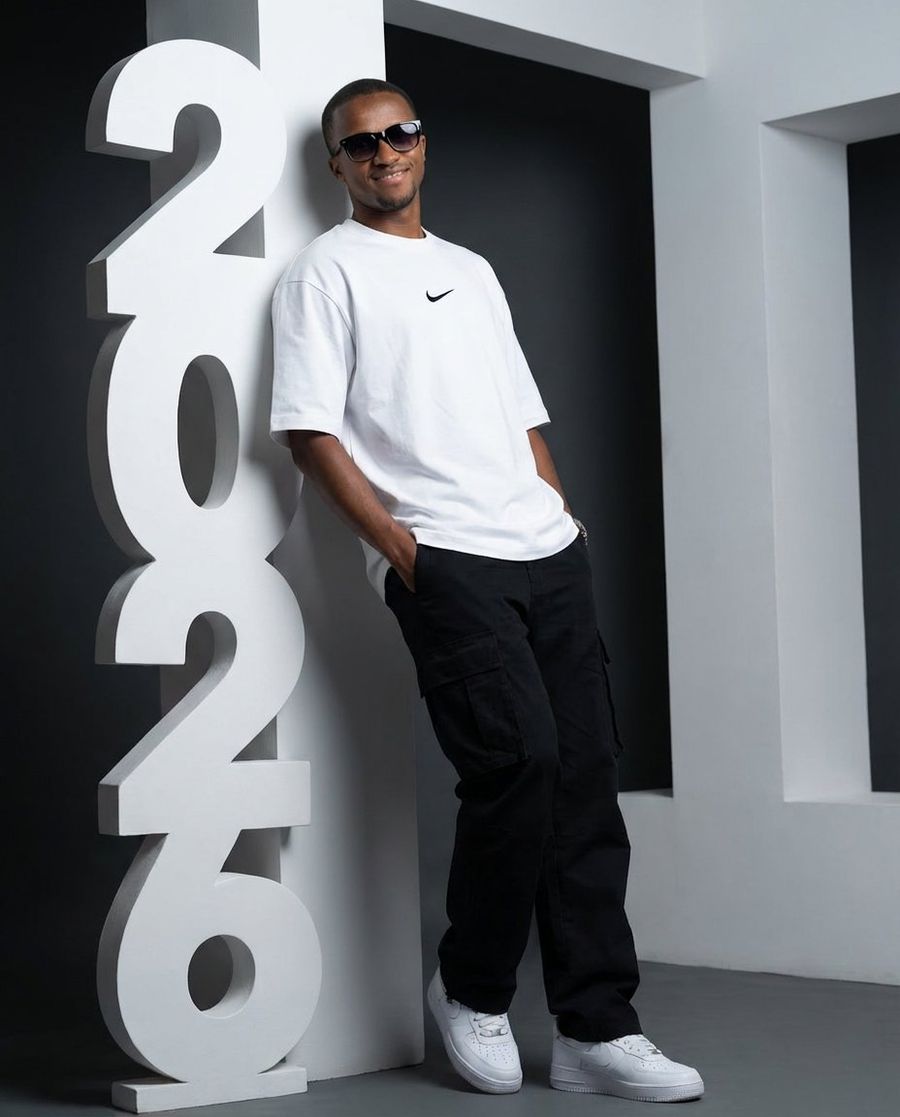 Low Angle Streetwear Portrait With Architectural Text — Nano Banana Pro image prompt example