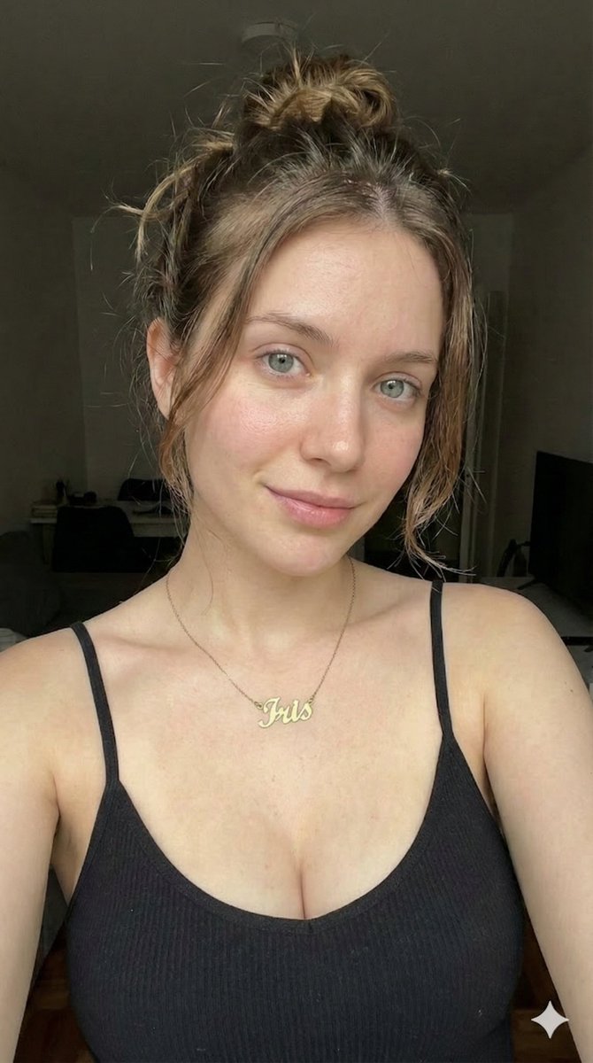 Low Key Close Up Portrait With Nameplate Necklace — Nano Banana Pro image prompt example