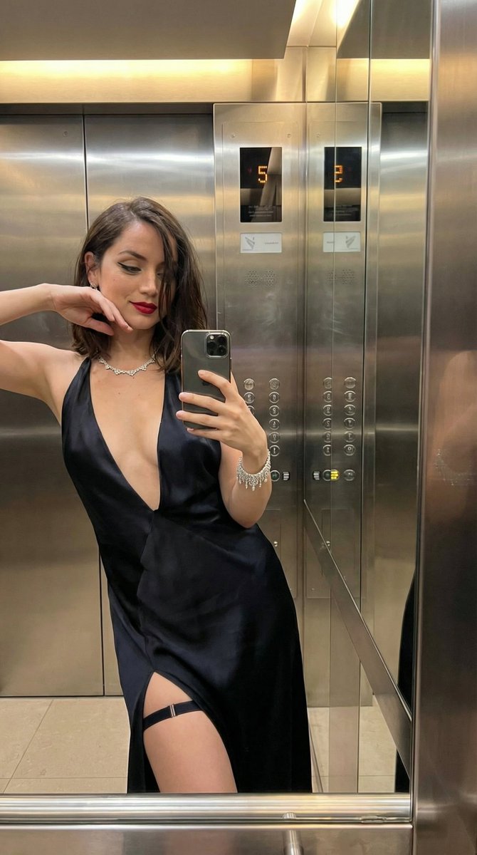 Luxury Elevator Mirror Selfie In Deep V Neck Dress — Nano Banana Pro image prompt example