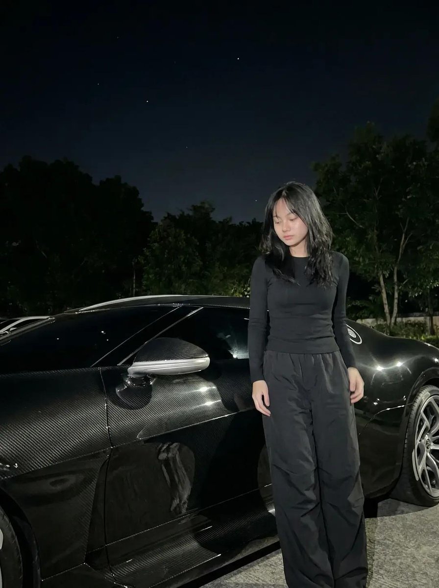 Nighttime Portrait With Luxury Car — generated with Nano Banana Pro