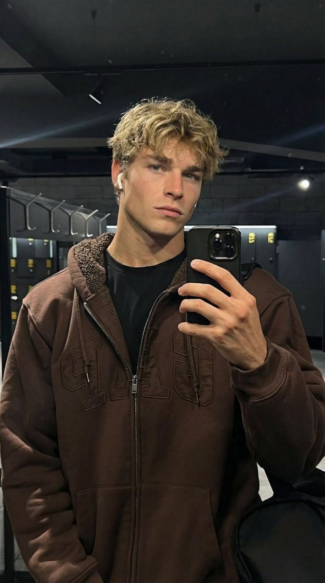 Photorealistic Mirror Selfie In A Modern Gym Locker Room — Nano Banana Pro image prompt example
