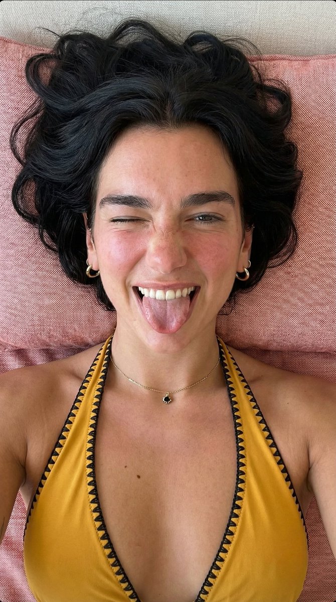 Playful Overhead Portrait Prompt Winking And Tongue Out — Nano Banana Pro image prompt example