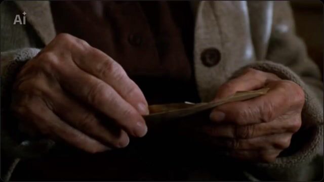 Elderly Woman Opening Envelope Video Prompt — Seedance 2.0 video prompt example